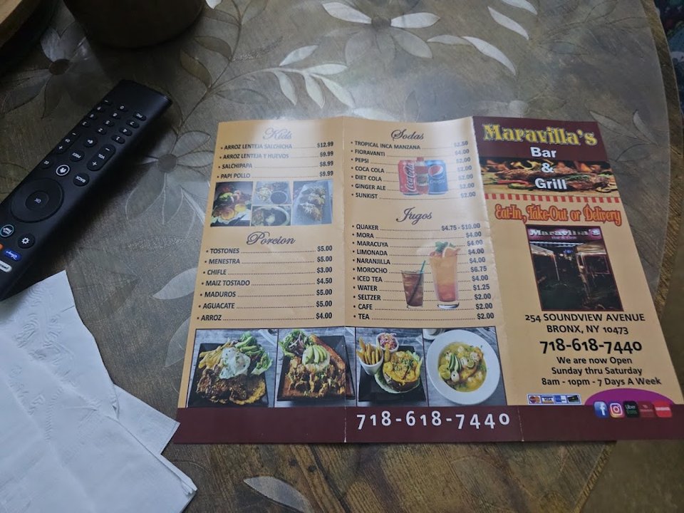 Printed menu for Ecuadorian dishes and drinks.